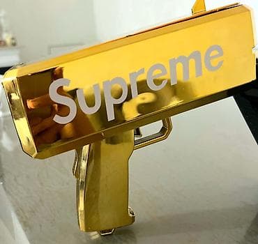 oyuncaq kassa: Məhsul: Supreme qızılı “Money Gun” (pul atıcı) Təsvir: - Parlaq — 5
