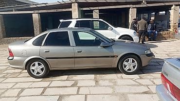 vaz 06 masin: Opel Vectra: 2 l | 1996 il Sedan — 2