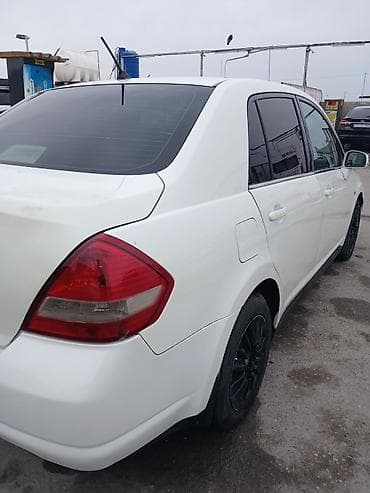 şevralit avtomobil: Nissan Tiida: 1.6 l | 2006 il Sedan — 4