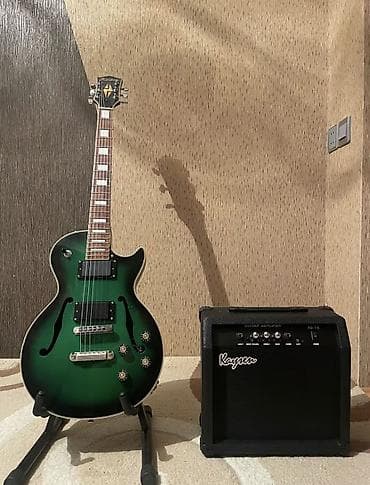 Salam les paul növlü elektro gitardır. Heçbir problemi yoxdu, set