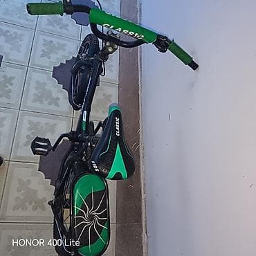 Dörd təkərli Uşaq velosipedi Stels, 16"