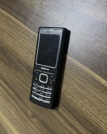 Apple iPhone: Nokia 6700 Slide, rəng - Qara, Düyməli — 1