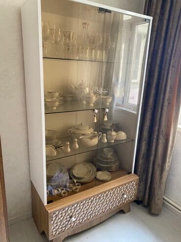 Şüşəli dolab vitrini, İşlənmiş, Ünvandan götürmə