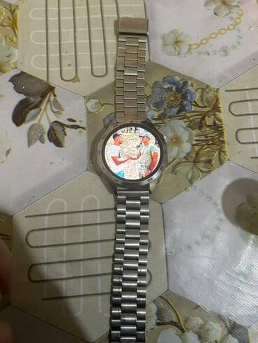 Metal qayışlı, dairəvi displeyli ağıllı saat. Xüsusiyyətlər: - Tam