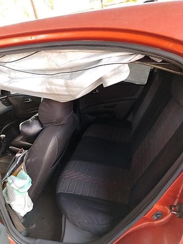 Kia Rio hatchback (CRDI, Sport paket yazıları ilə). Narıncı-qara iki — 6