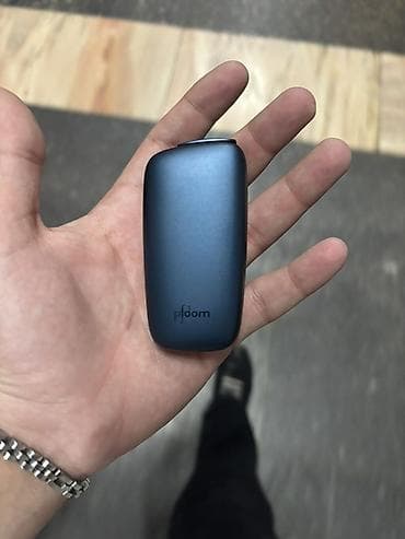 hid disposable vape 8000: Ploom tütün qızdırma cihazı - Kompakt və ergonomik dizayn: ovuca — 1