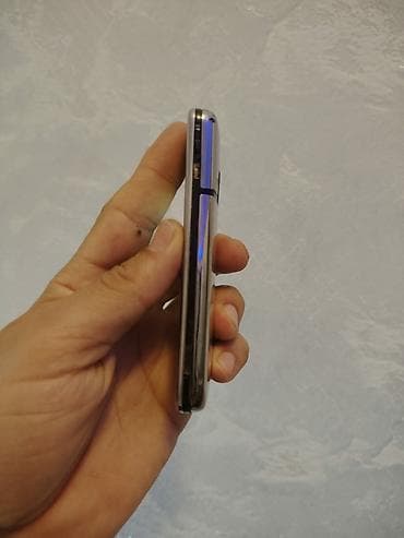 playsation 3: Nokia 8000 4G, 512 GB, rəng - Gümüşü, Düyməli, Barmaq izi, İki sim kartlı — 6