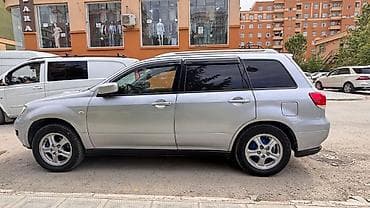 Транспорт: Mitsubishi airtrek 2003 2 sadə mator ön çəkən Təkərlər təzə di — 2