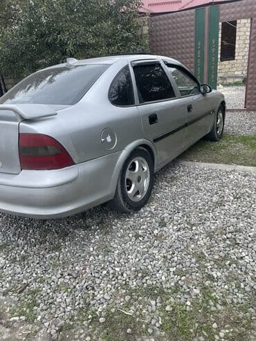 07 diskləri: Opel Astra: 1.6 l | Sedan — 4