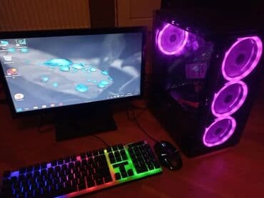 kompyuter hisseleri: Qabaqda üç ədəd mavi işıqlı ventilyatoru olan qara rəngli kompüter — 3