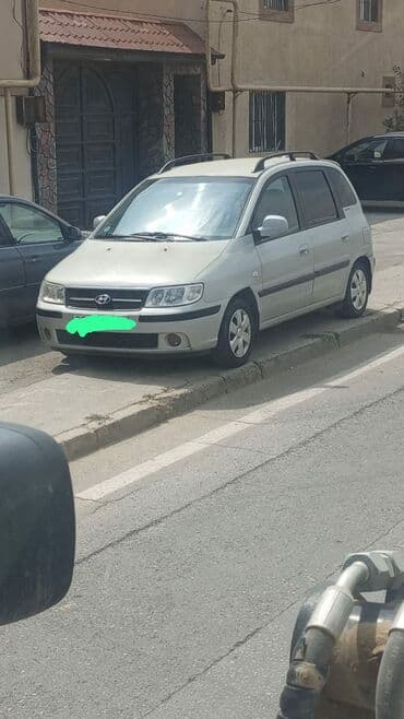 yeşqa maşın: Hyundai Matrix, ağ rəng, şəhərdaxili və ailə istifadəsi üçün praktik — 3