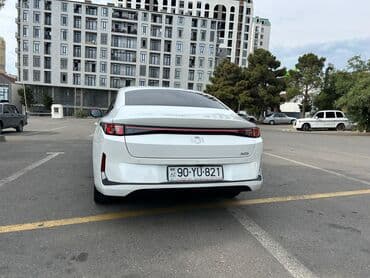 bmw x7 2009: Changan Qiyuan A05: 1.5 l | 2024 il 24085 km Sedan — 9