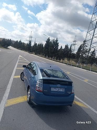 Avtomobil alışı: Toyota Prius (2-ci nəsil) hibrid sedan - Rəng: mavi - Kuzov: liftbek — 1