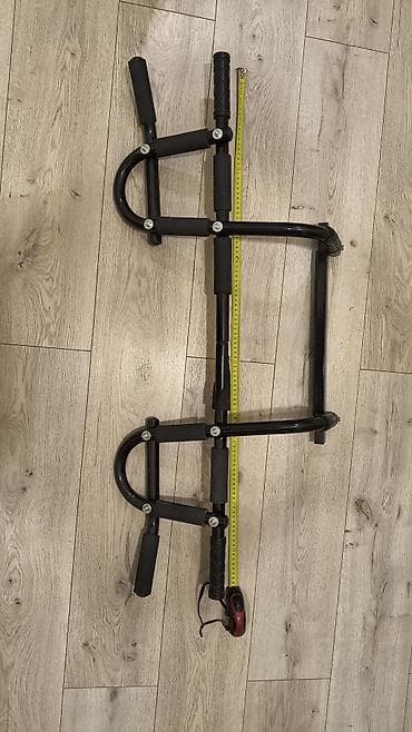 gitara satilir: Turnik. qapının üst hissəsinə keçirilən. satışda 170 manatadır. evdə — 2
