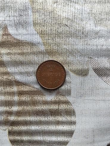 gitara simleri: Məhsul: İsveç 1 krona sikkəsi (2016) Təsvir: - Nominal: 1 krona (EN — 1