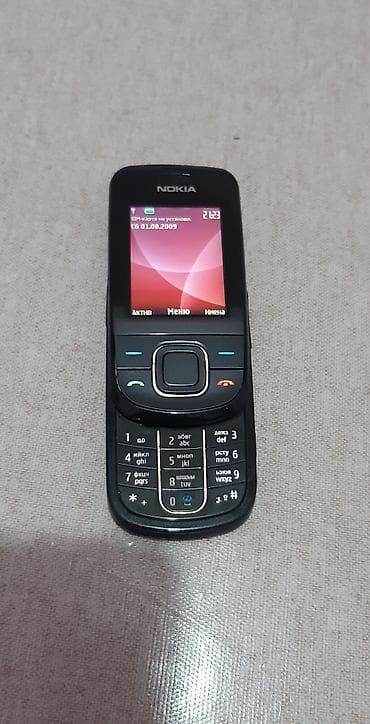Техника и электроника: Nokia 1, цвет - Черный, Кнопочный — 2