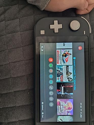 notbuklarin satisi: Nintendo switch lite satılır bir qüsürü yoxdu adaptırı yanında hediye — 10