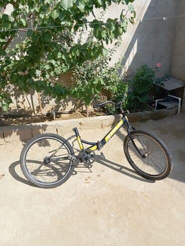 BYD: Qara və sarı rənglərdə olan bu velosiped, kənd yolları və şəhər — 2