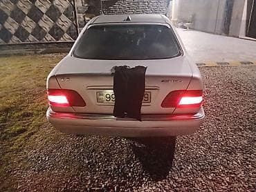 w210 panel: Mercedes-Benz E-Class: 2.8 l | 1997 il Sedan — 2