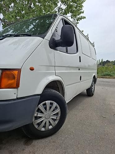 1993 bmw 318i: Ford Transit: 2.5 l | 1998 il 35800 km Van body type — 2