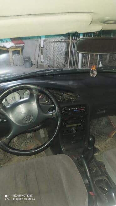 niva 4 qapili: Hyundai Sonata: 2 l | 1997 il Sedan — 2