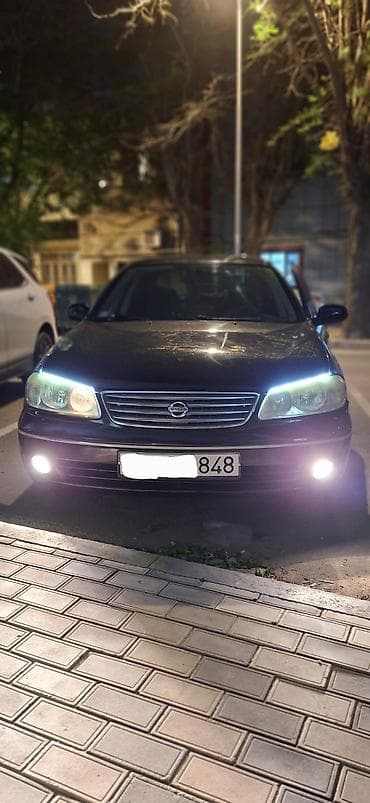 skuter servis: Nissan Sunny: 1.6 l | 2008 il Sedan — 2
