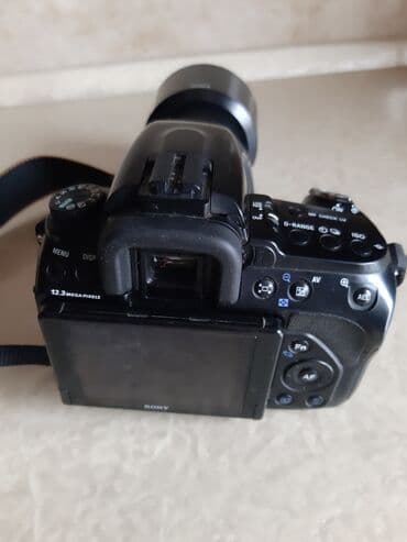 knopkalı: Fotoaparat Sony a500. Probeqi azdır. Şəkil çəkmək üçün knopkası — 6