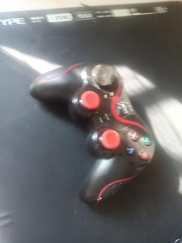 xbox oyunlar: Məhsul: Simsiz oyun pulti Xüsusiyyətlər: - Rəng: qara-qırmızı - — 4