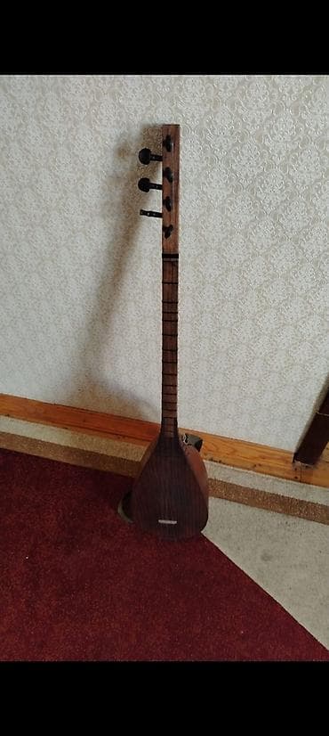 Saz: Saz – uzun qollu, armud formalı korpuslu milli simli musiqi aləti — 1