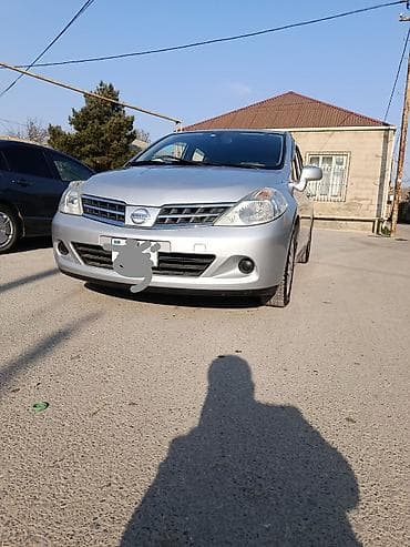 Nissan Tiida: 1.5 l | 2011 il Hetçbek