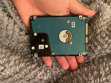 lider disk satilir: Daxili Sərt disk (HDD) Toshiba, 512 GB, 5400 RPM, 2.5" — 2