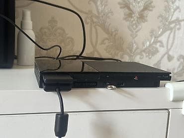 Sony PlayStation 2 Slim (SCPH seriyası) oyun konsolu Xüsusiyyətlər: - — 3