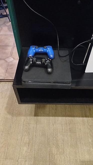 playstation 2 oyunları: PlayStation 4 Slim oyun konsolu Xüsusiyyətlər: - PS4 Slim korpusu, ön — 1