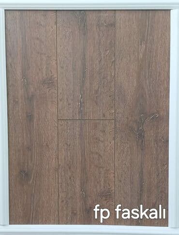 suya davamlı laminat: Taxta örtüyü FP faskalı, otaqlara təbii və isti bir görünüş verir. Bu — 1