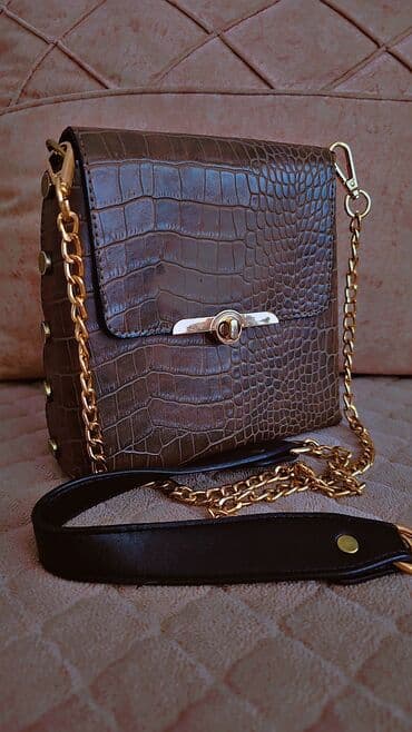 Əl çantası, İşlənmiş