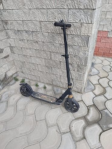 Şəhər daxili rahat hərəkət üçün mexaniki skuter. Xüsusiyyətlər: - — 1