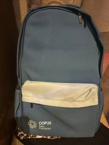 Mavi rəngli uniseks bel çantası.Çantanın ön hissəsində əlavə cib, əsas