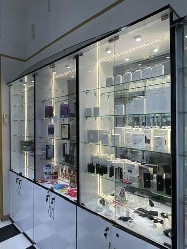soyuducu temir: Telefon mağazasının içinde 3 vitrin arendiya verilir telefon satışı — 4