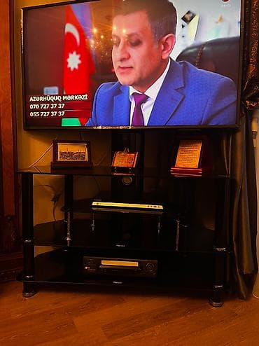 stend: Televizor altlığı satılır. Yaxşı vəziyyətdədi. Televizor üstünə — 2