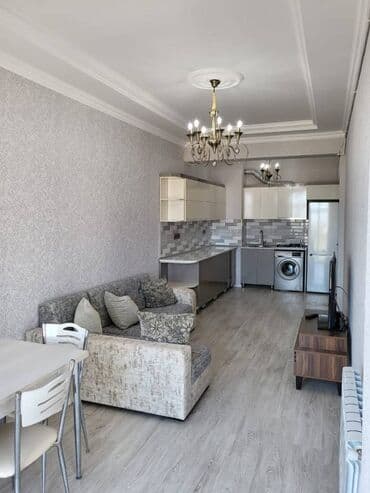 kirayə restoran: Sumqayıtda Bagca şəhər kompleksində yerləşən 16 mərtəbəli binanın — 14