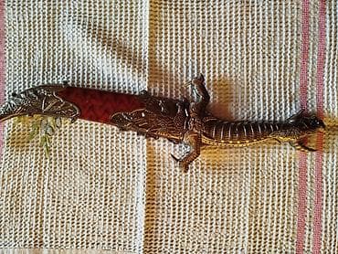 kubok qiyməti: Suvenir qılınc.Qiymet razılaşma yolu ilə — 1