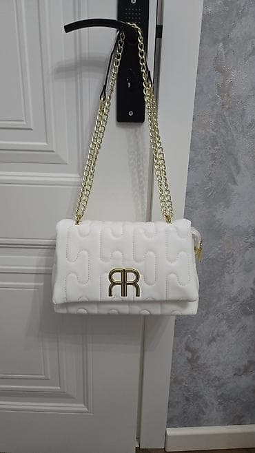 Çox keyfiyyetli ag çanta.1 eded qalib.Ölçüsü 27×18