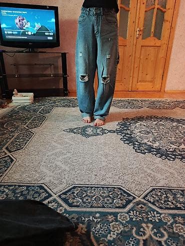 Geniş kəsimli, yüksək belli cins şalvar. - Rəng: Klassik mavi denim -