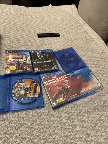 oyun sukani: PS4 oyun diskləri dəsti Catırılma Paketdə olan oyunlar: - The Crew 2 — 1