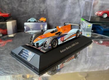 где можно продать марки: Коллекционная модель Aston Martin AMR-One #7 Gulf Team LeMans 2011 — 11