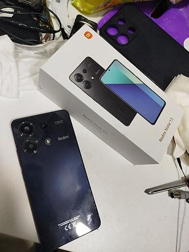 Xiaomi Redmi Note 13 – qutu və aksesuar yerinə uyğun model