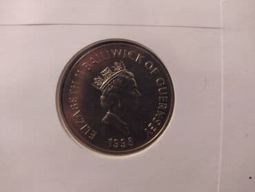 üstündə gerb olan qəpiklər: 5 funt Elizabeth II "Anatoliy Banişevskiy" 5 funt Guernsey, Elizabeth — 1