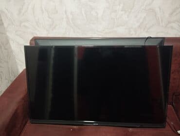 Информатика: LED televizor - Ekran: 1.07 çərçivəli düz panel - Rəng: qara - Ön — 2