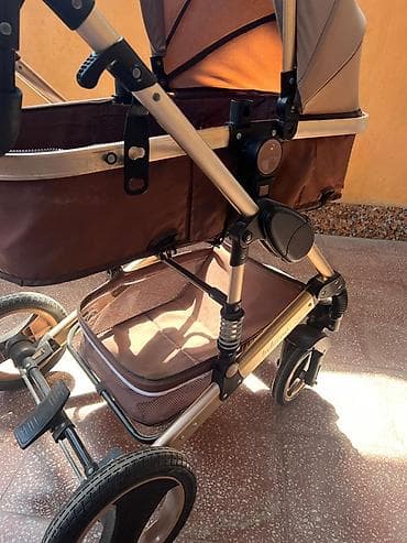 usag sirgasi: Çıxarıla bilən beşikli araba — 1