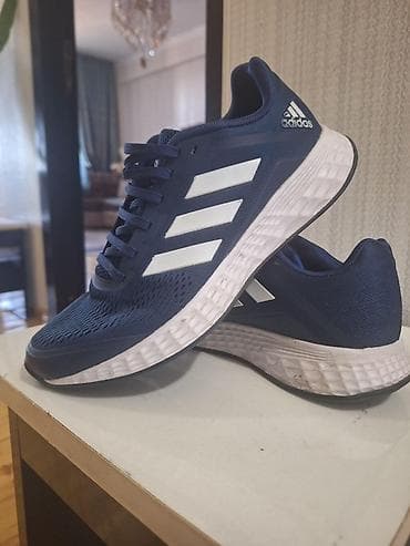 Orginal Adidas idman ayaqqabısı. Tünd göy rəngdədir, yan hissəsində ağ lalafo.az -da Orginal Adidas idman ayaqqabısı. Tünd göy rəngdədir, yan hissəsində ağ